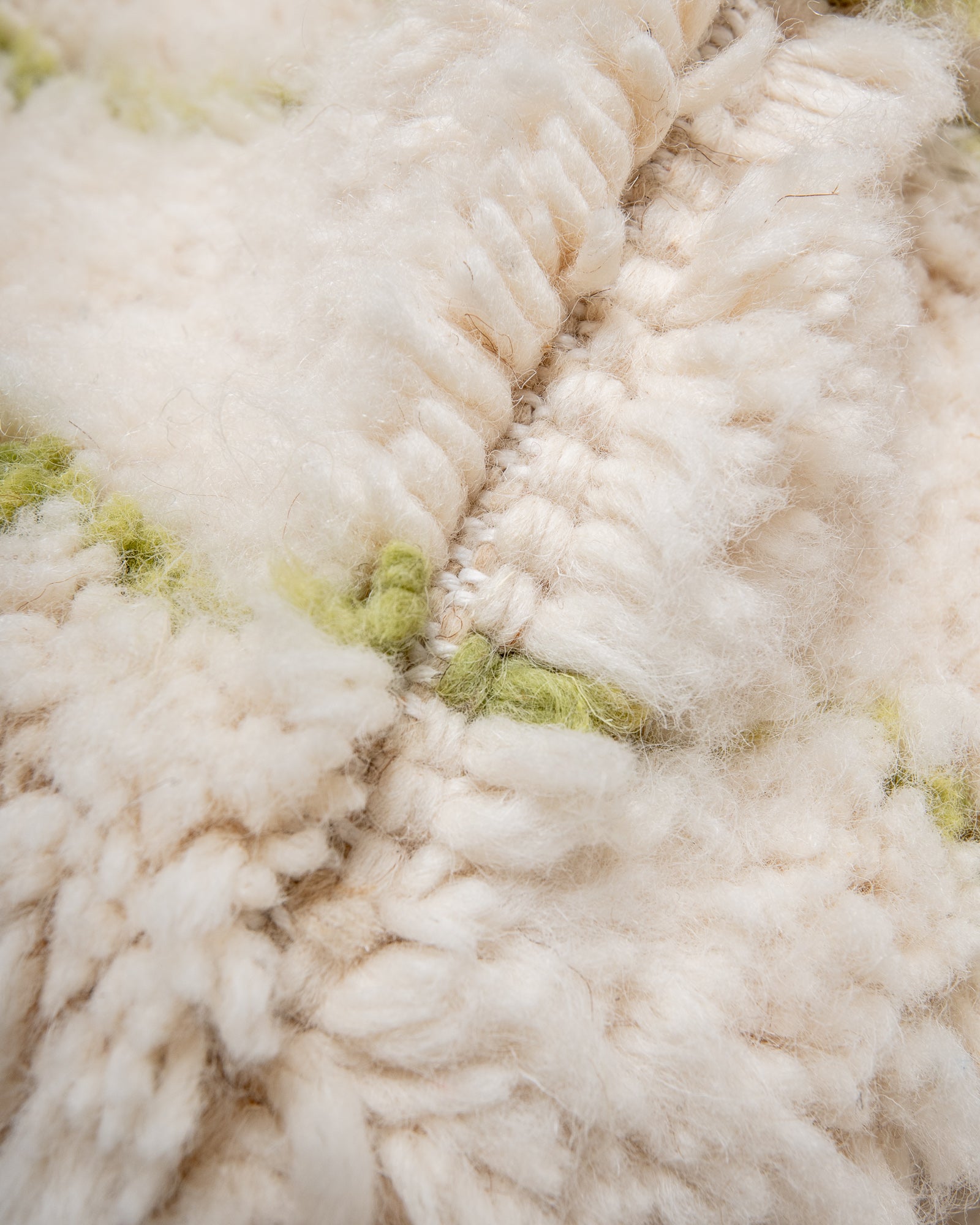 Modern, designer, handcrafted Berber rug from Morocco. Beniourain carpet with minimalist design, natural wool pile and a fluffy texture.